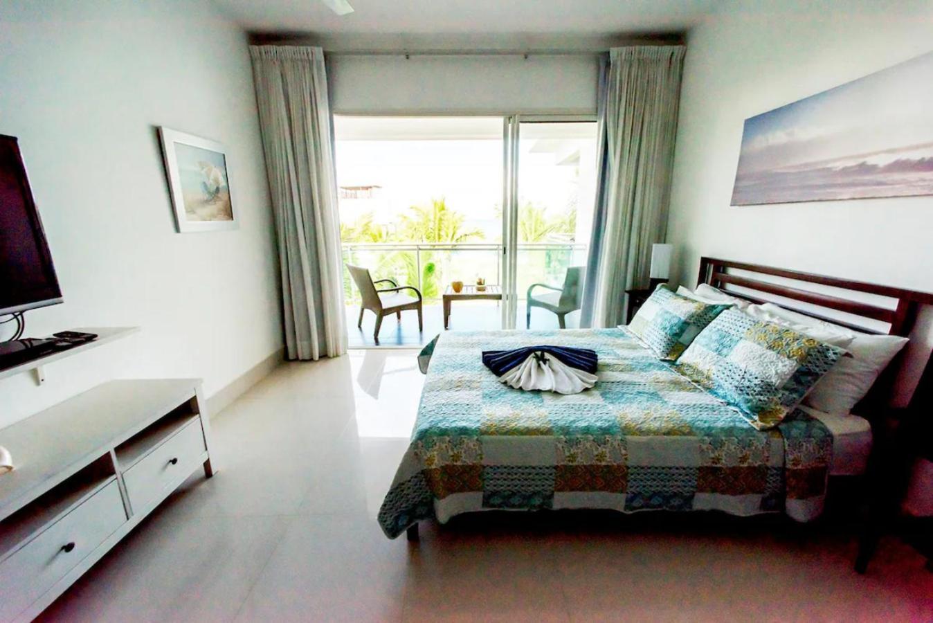 Seawinds Studio - Beachfront Getaway 카바레테 객실 사진